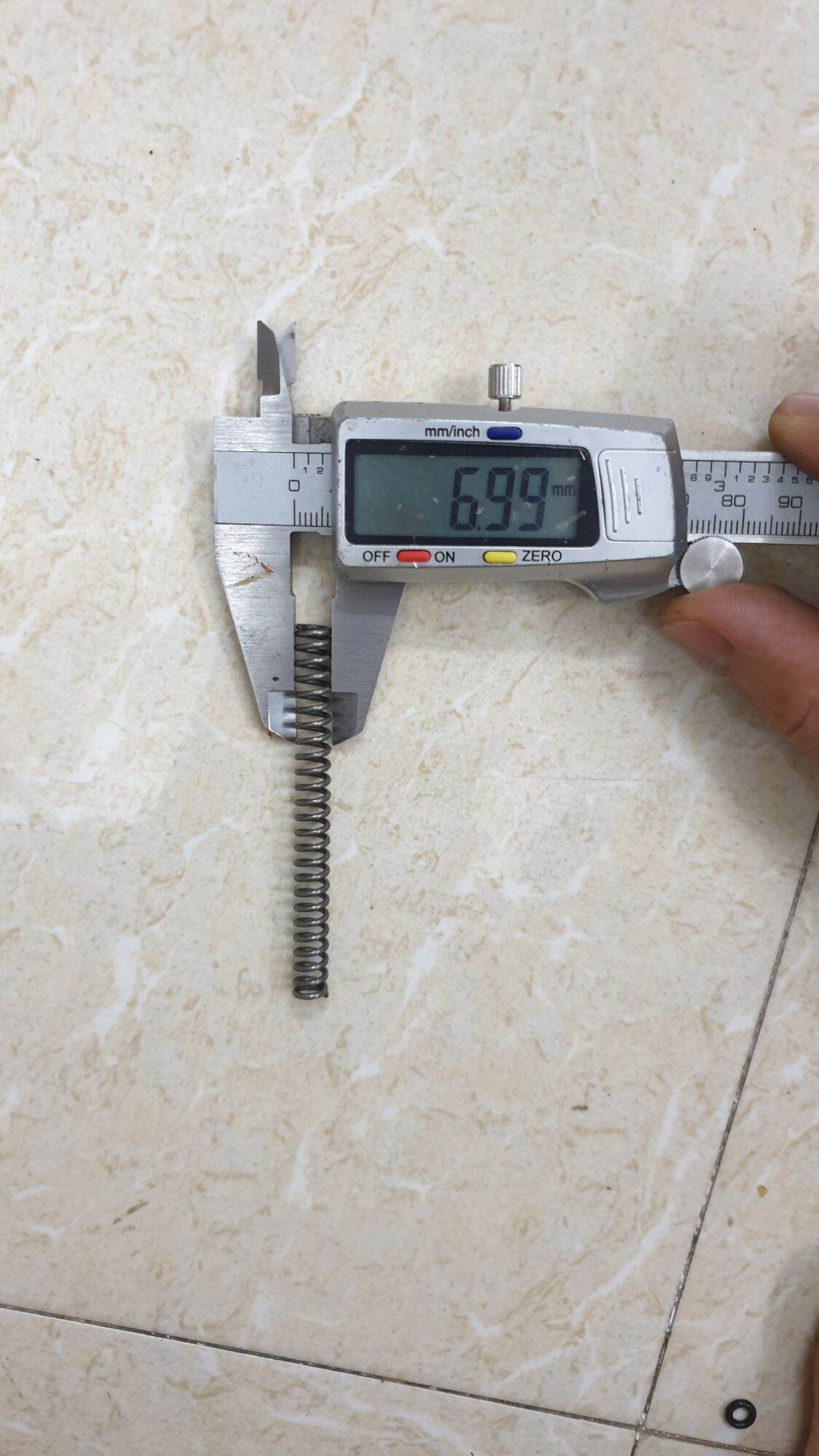 Lò xo phi 7 sợi 1.2 dài 7cm