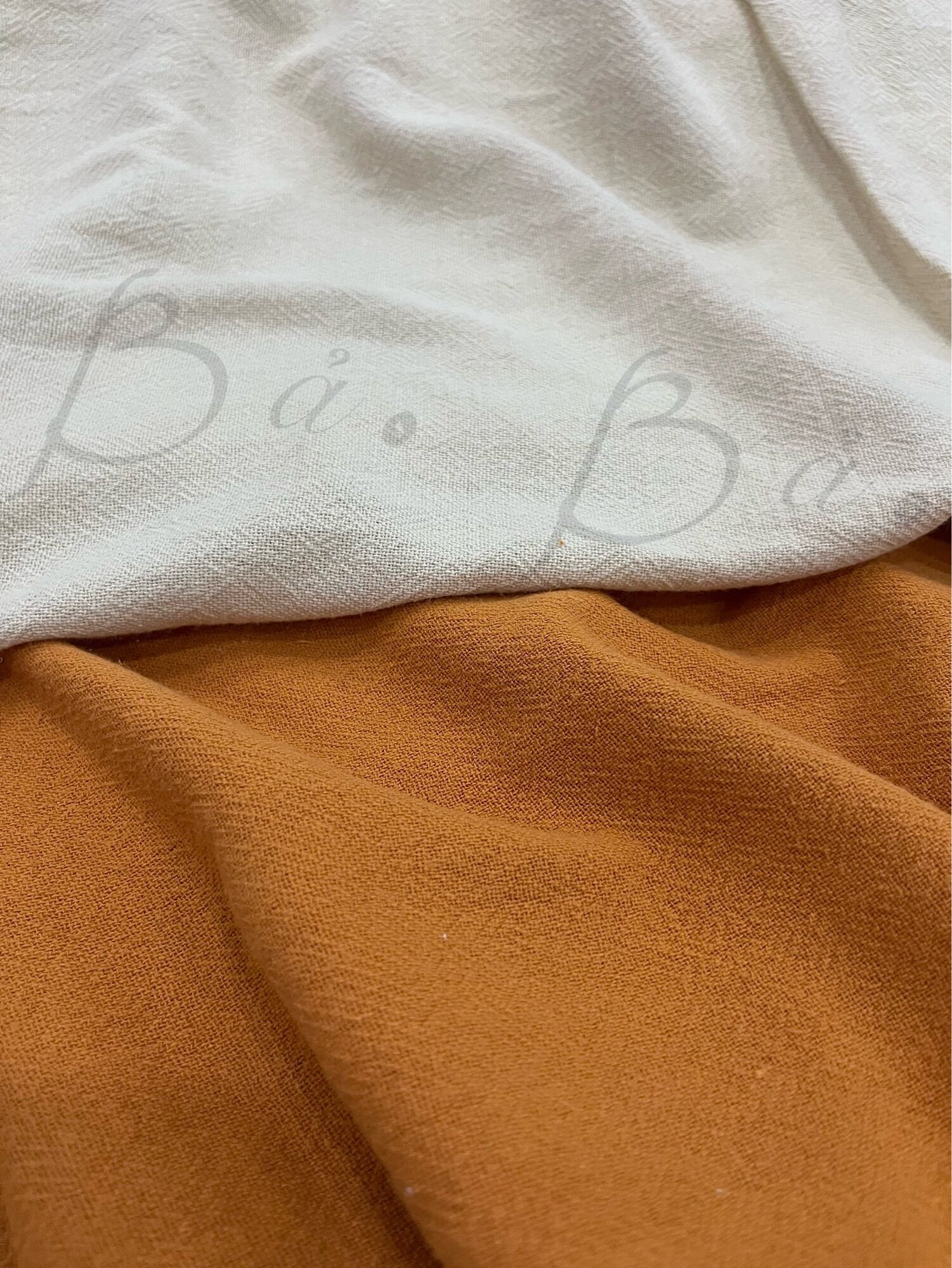 Vải xô cara cotton dệt kem be/cam cà rốt mềm rũ khổ 1m40