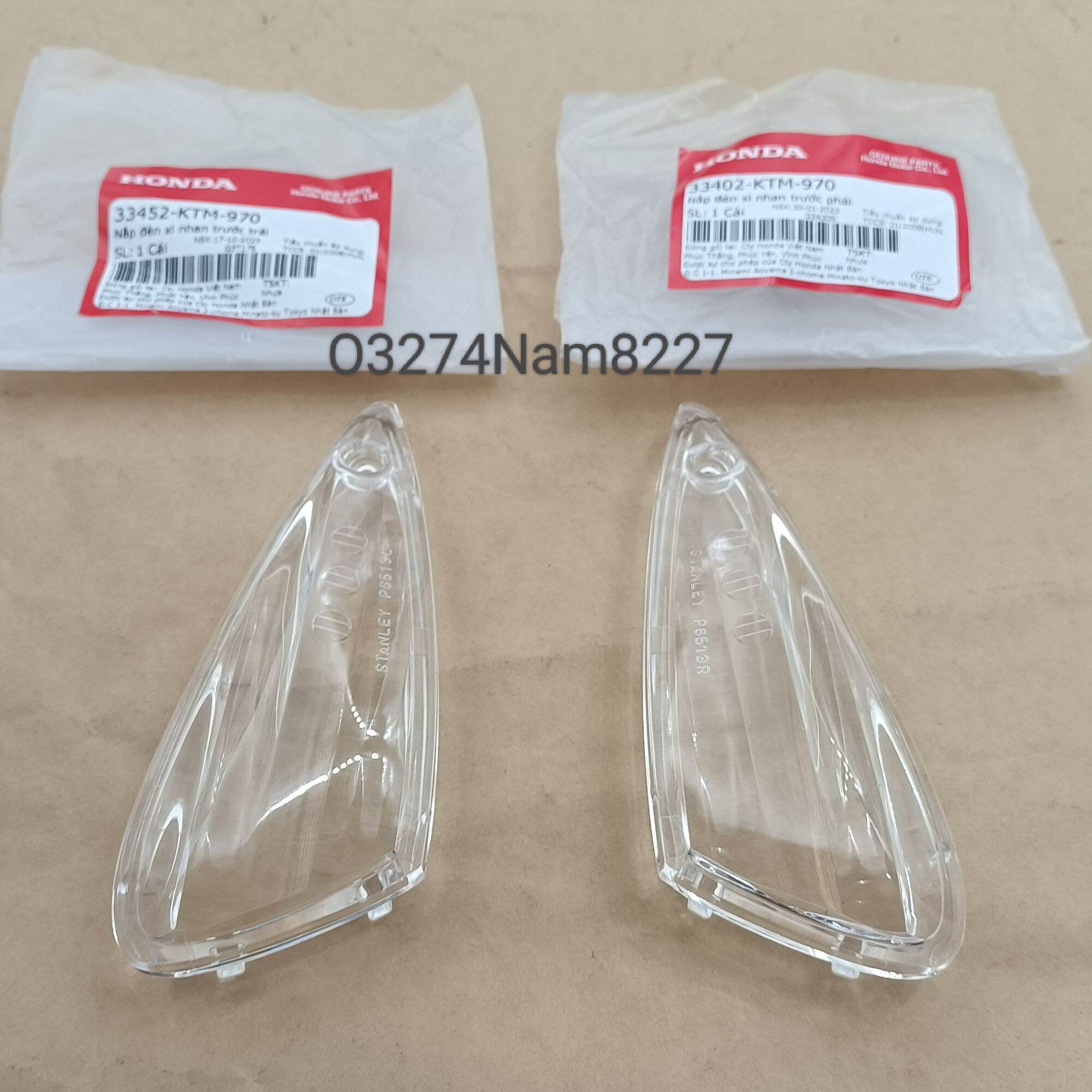 Cặp nắp, chụp ốp võ đèn xi nhan trước xe FUTURE NEO 125 zin