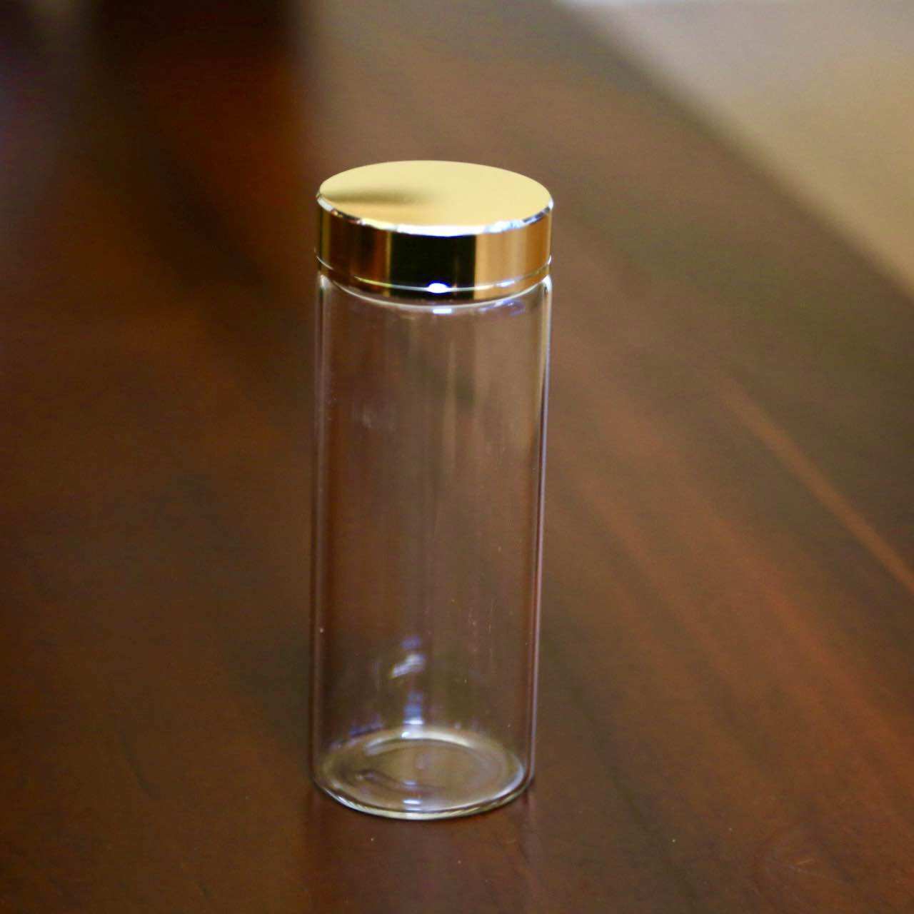 Lọ thuỷ tinh nắp vàng 4.7x12cm đựng trầm