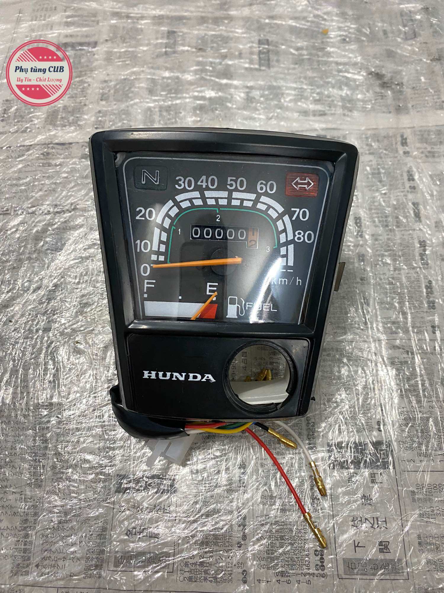 Đồng hồ xe cub DD70 mặt chữ thường