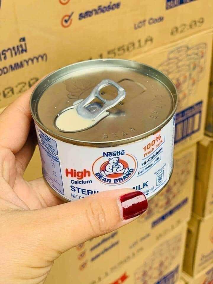 12 lon sữa gấu nestle.Thái Lan nội địa
