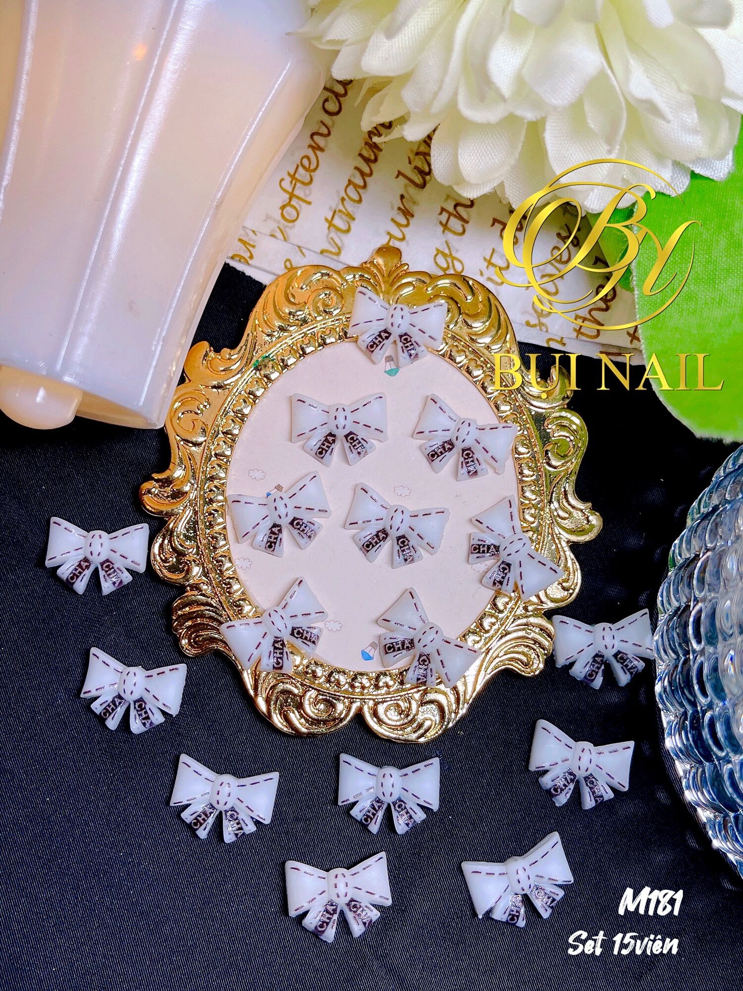 Charm nơ m181 set 15viên
