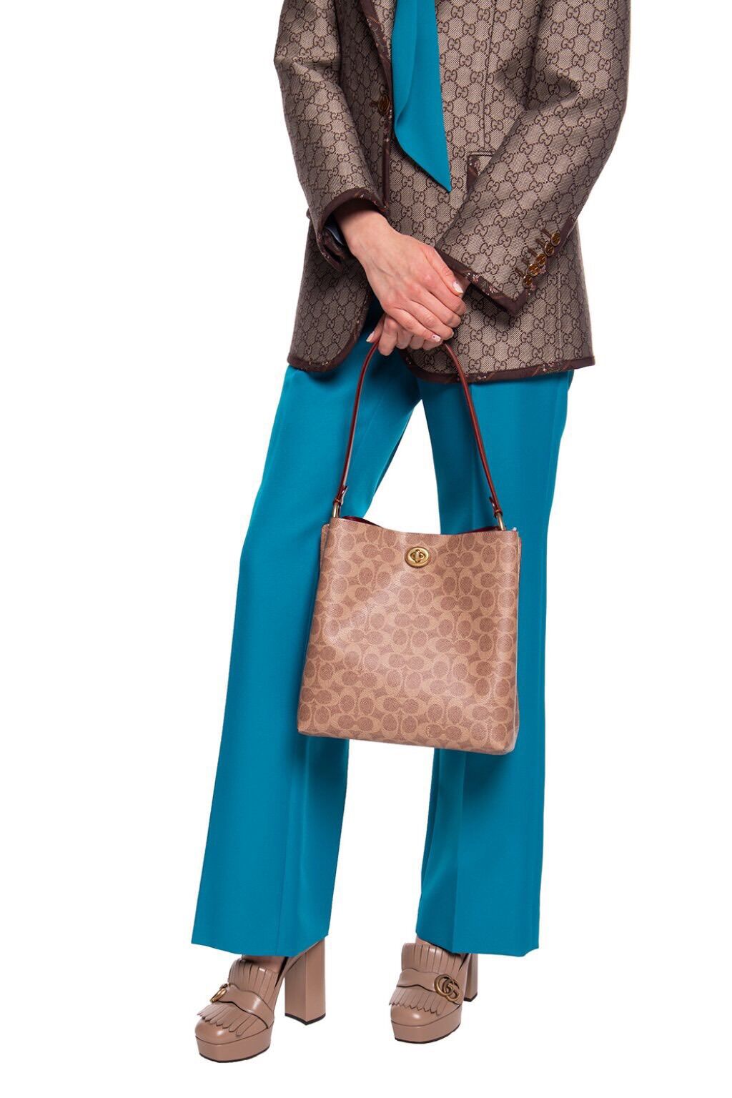 Túi Coach bucket khoá xoay dư xịn