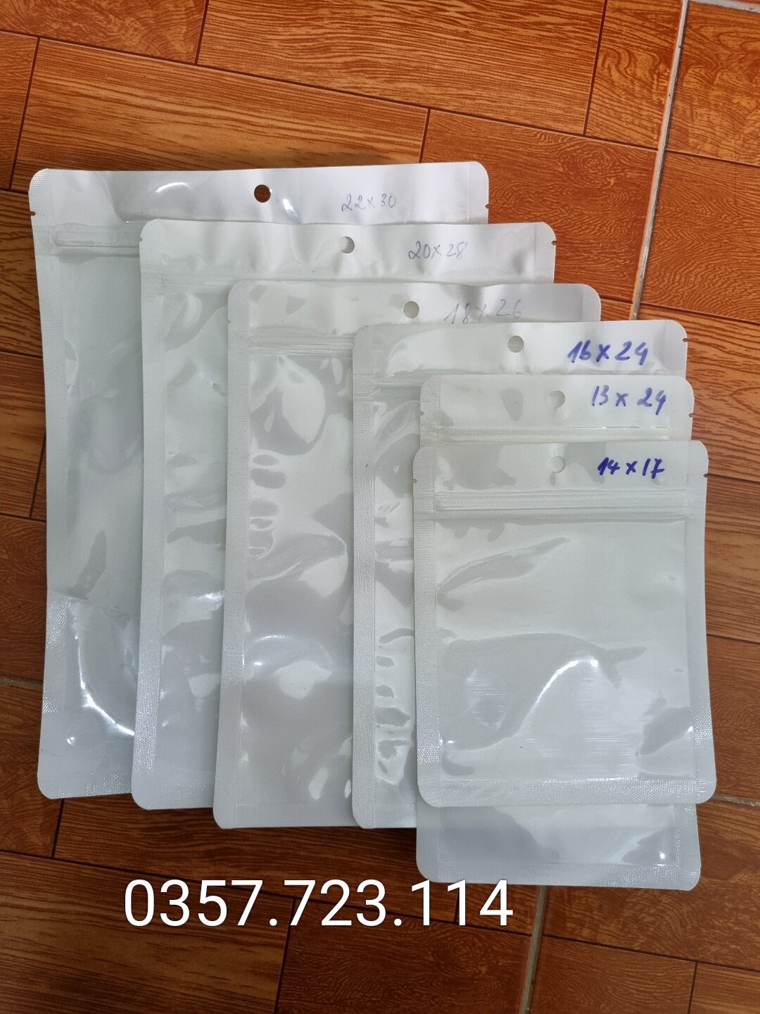 100 gam túi zip mặt trong mặt trắng sữa đáy liền có lỗ treo