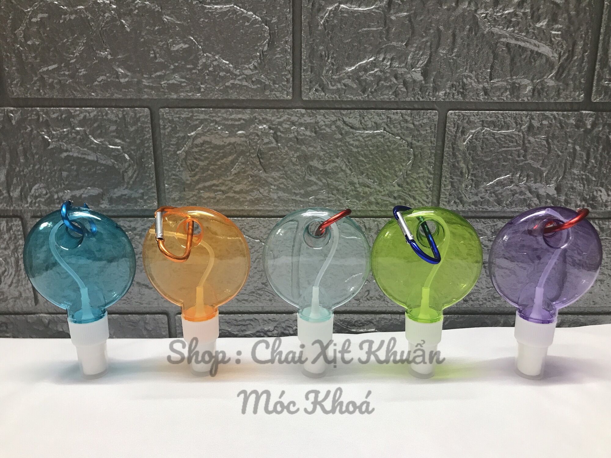 Chai xịt khuẩn tròn mini móc khoá 50ml , bình rỗng đựng cồn