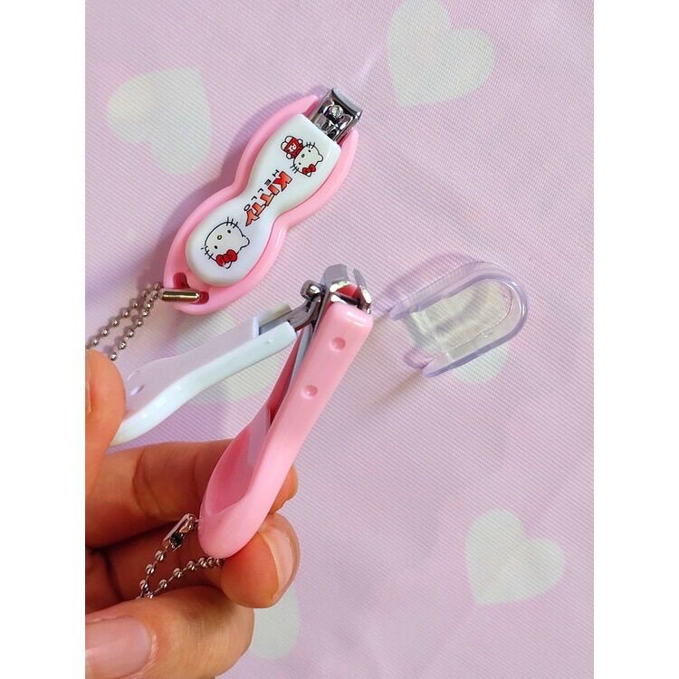 Bấm móng tay Hello Kitty - Doremon Doraemon