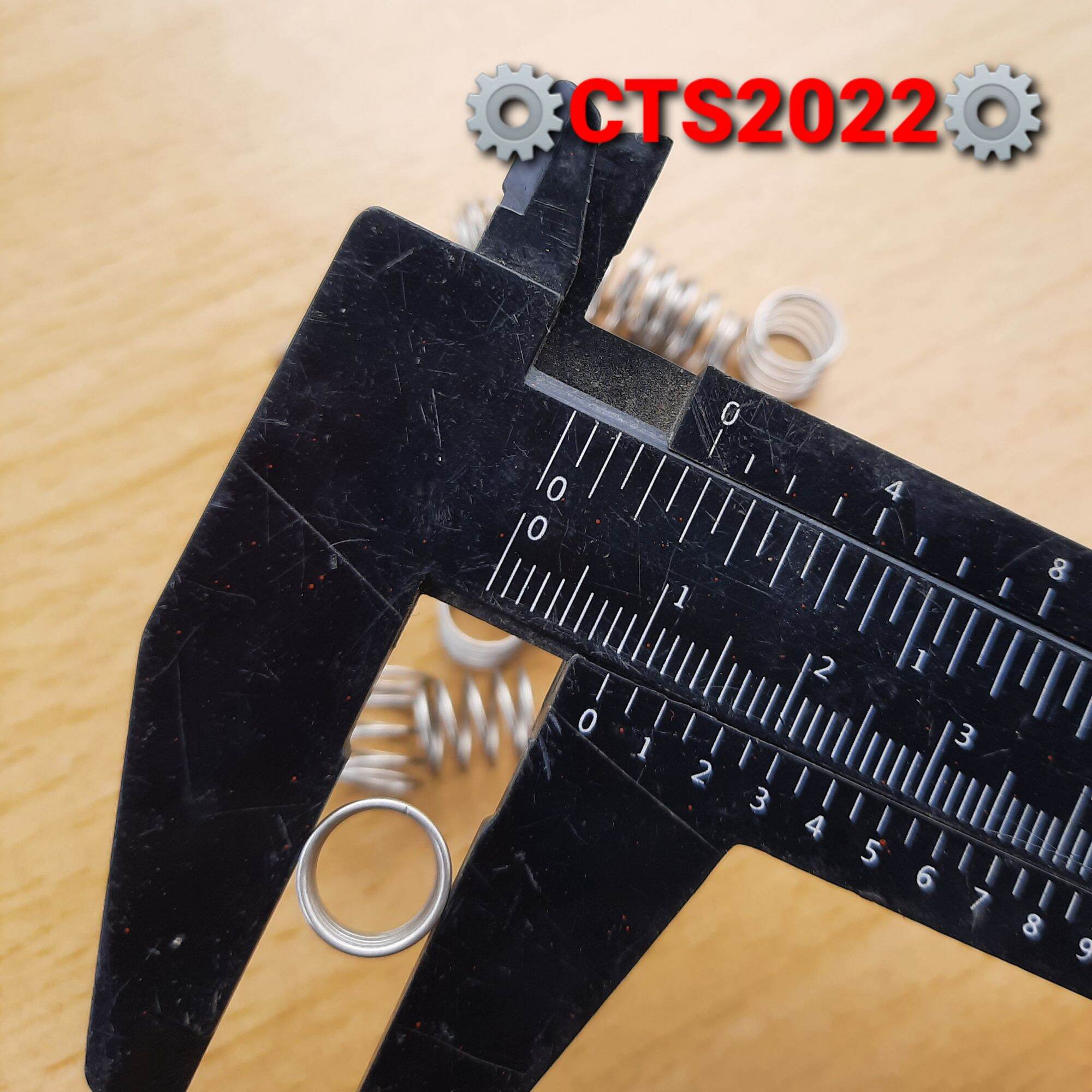 Lò xo nén inox phi 9mm sợi 0.5mm dài 10mm
