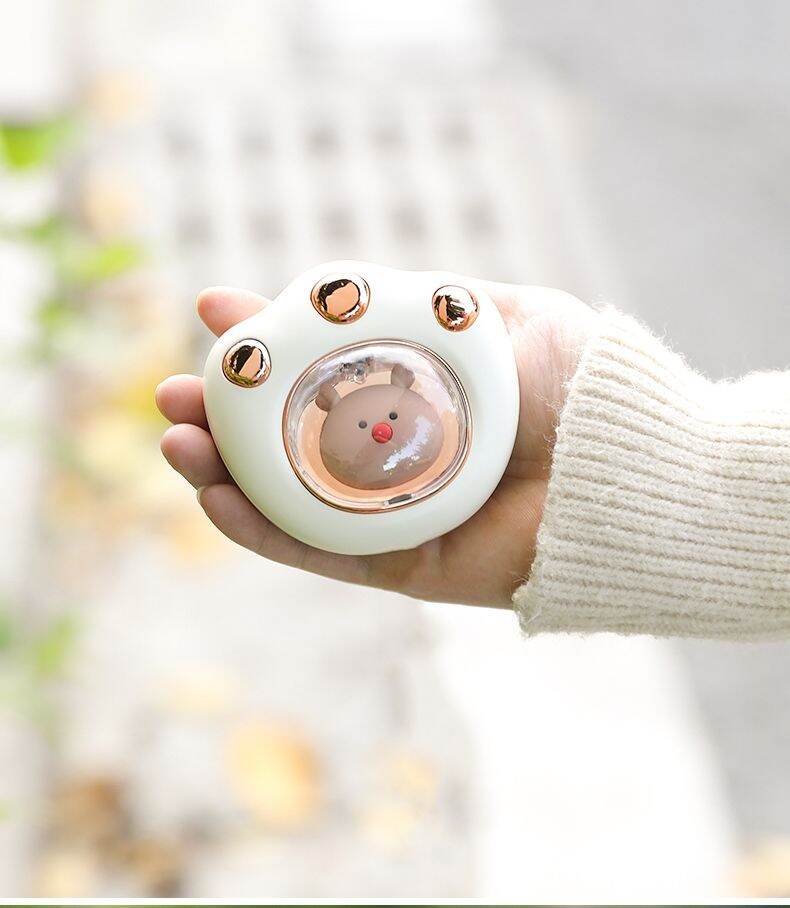 máy sưởi mini cầm tay chỉ cần sạc pin và ấn nút