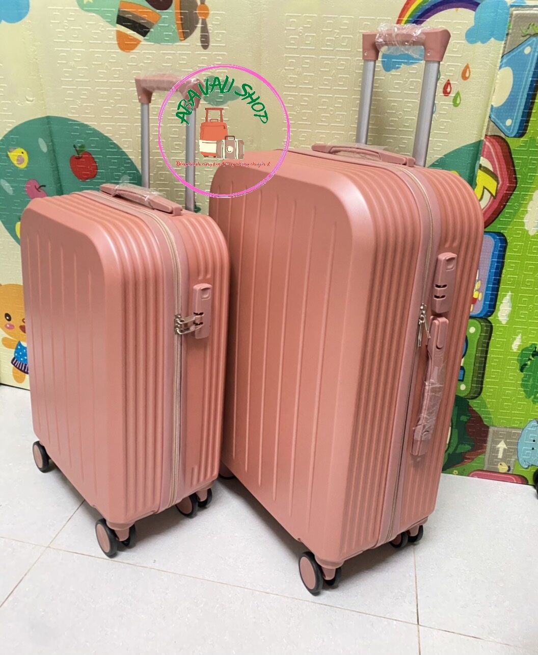 Combo Vali nhựa  du lịch màu hồng  20 inch và 24inch