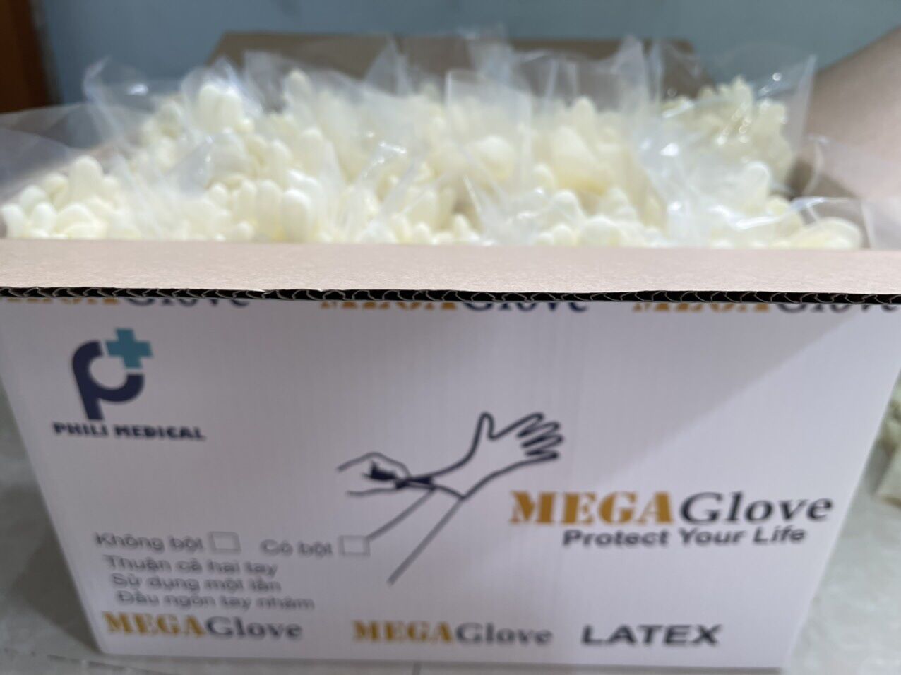 01 thùng găng tay y tế latex khám bệnh Mega glove, đong bịch giá thấp hơn đong họp