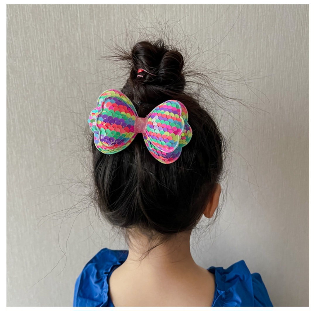 Kẹp tóc nơ bé gái đính kim sa lấp lánh