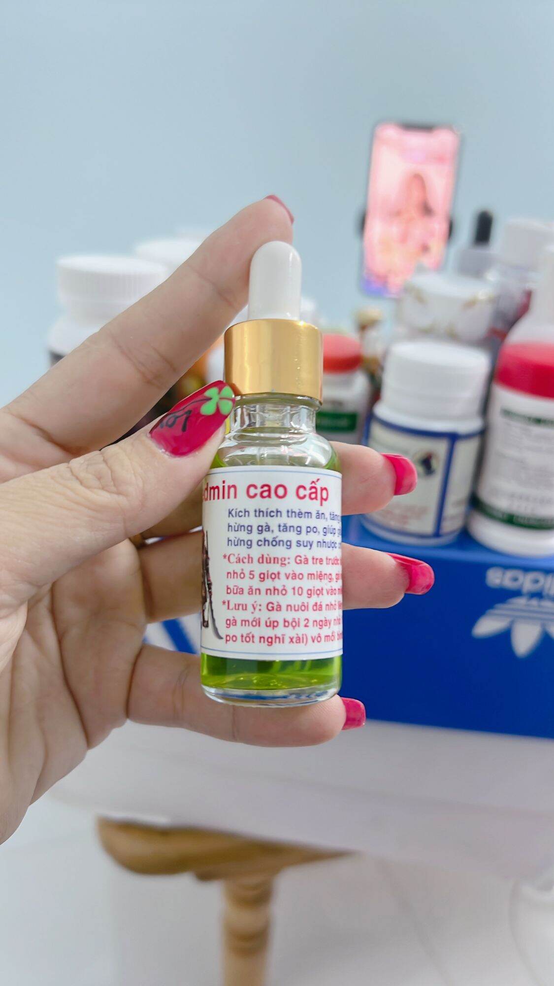 Redmin xanh_ chai 20ml: gà đá mau tăng cân,sung hừng gà