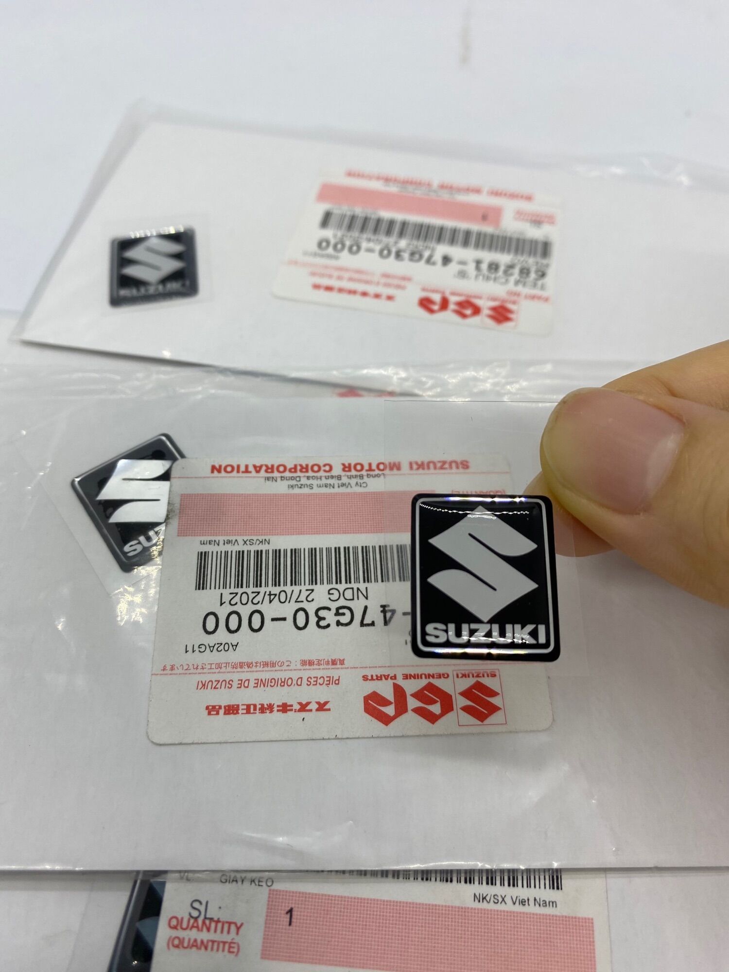 Tem logo suzuki nắp bình nước satria fi raider fi suzuki