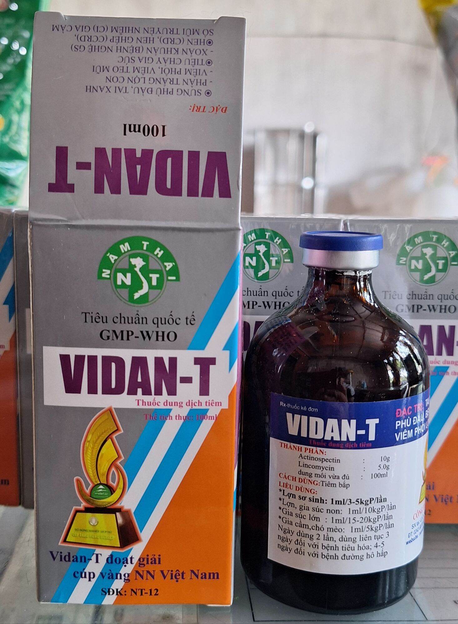 Vidan T 100ml (Năm Thái) Tai xanh, phù đầu, bênh nghệ, tiêu chảy trên heo, gia súc và gia cầm