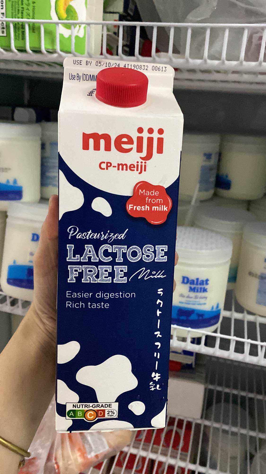 Meiji free lactose thanh trùng 946Ml date mới