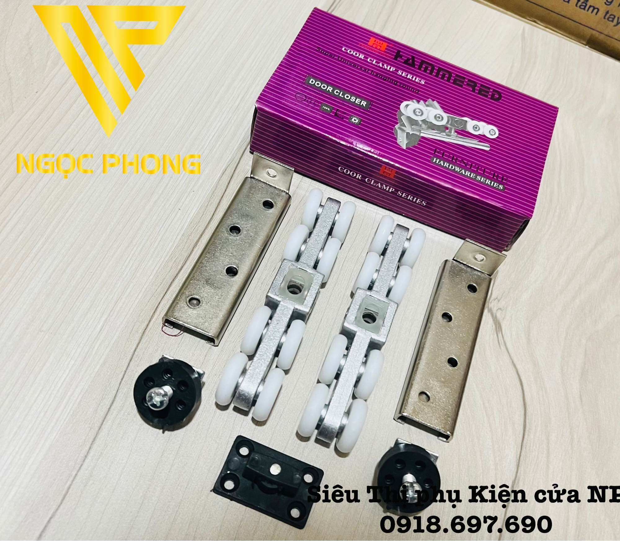 Bộ bánh xe treo cửa lùa nhôm - sắt -gỗ hộp tím