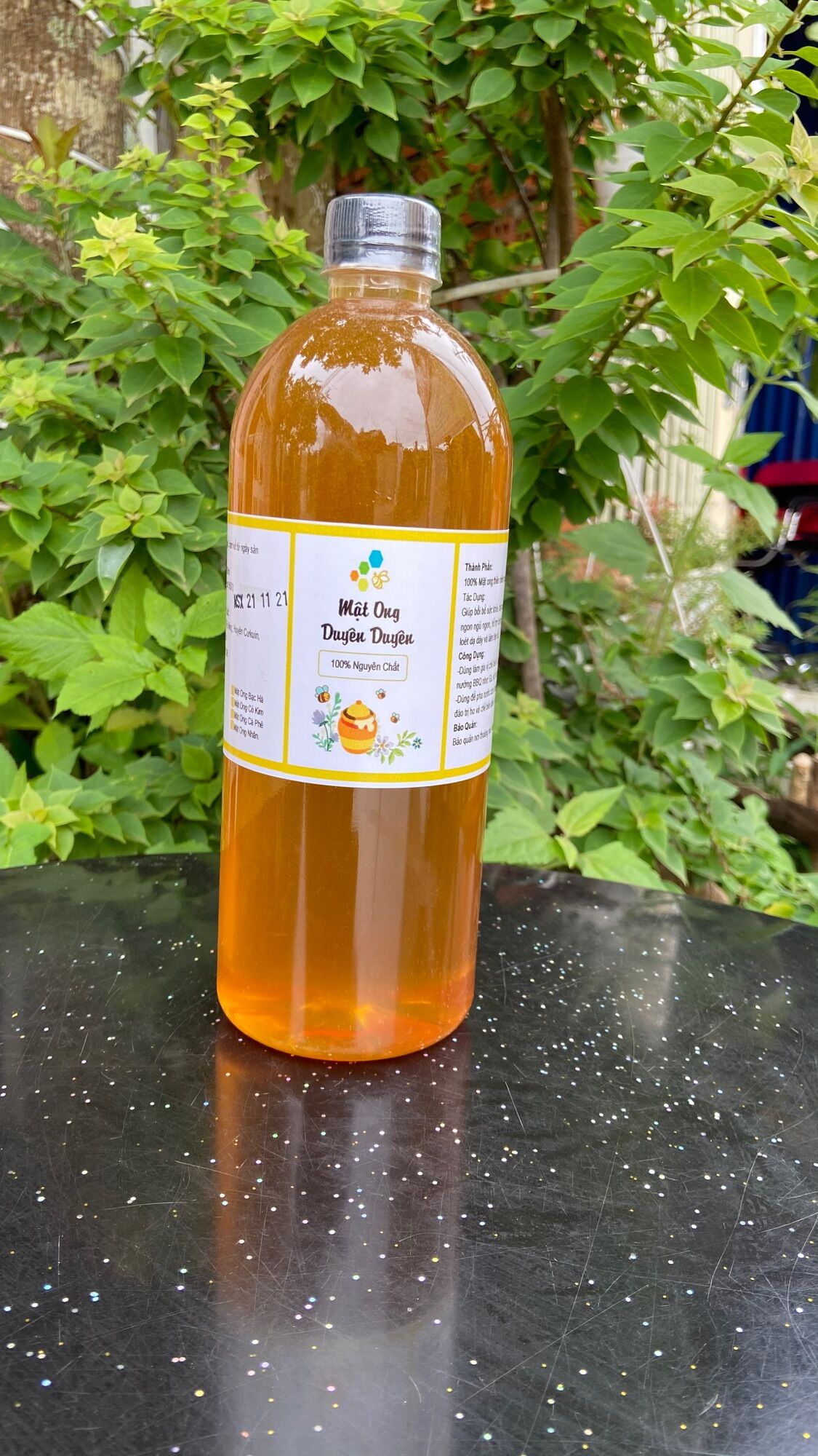 Mật Ong nguyên chất Hoa Cỏ Kim chai 1 Lít