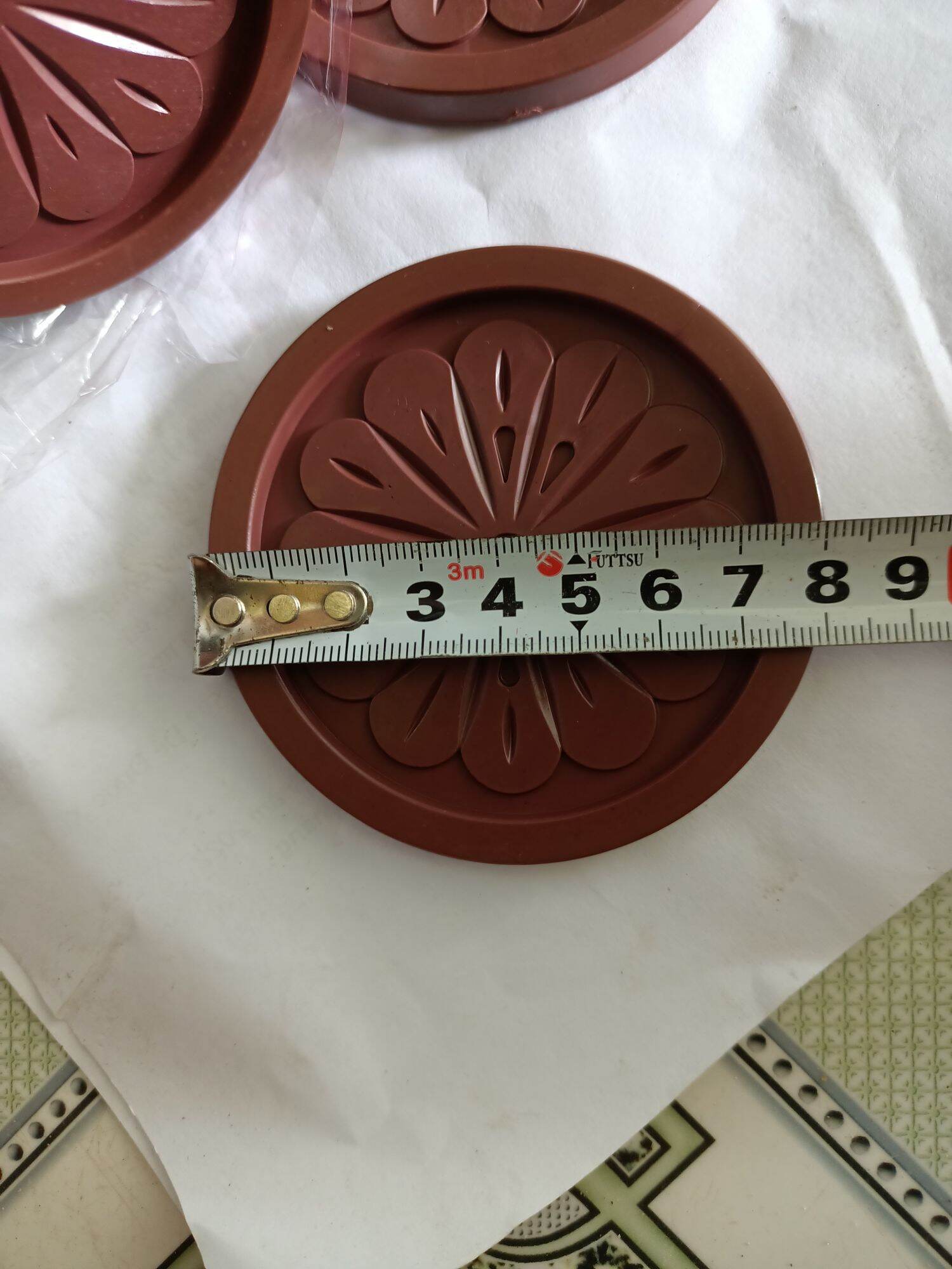 đế lót ly bằng nhựa dẻo