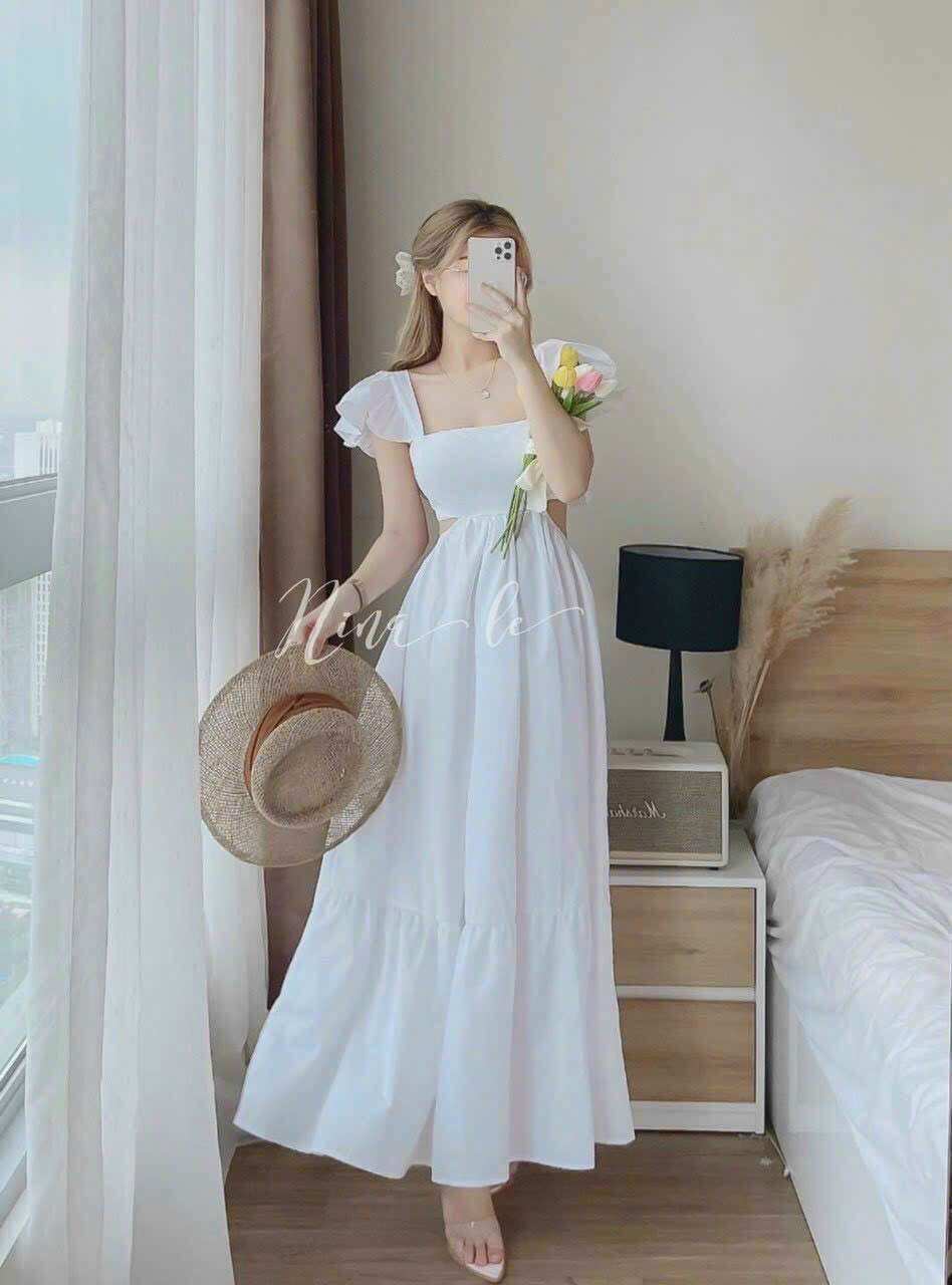 Đầm maxi khoét eo dây cột nơ lưng trẻ trung