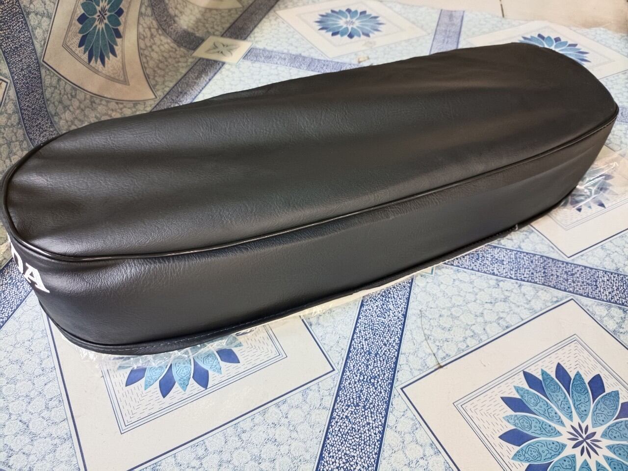 Áo yên xe 67 đời cũ
