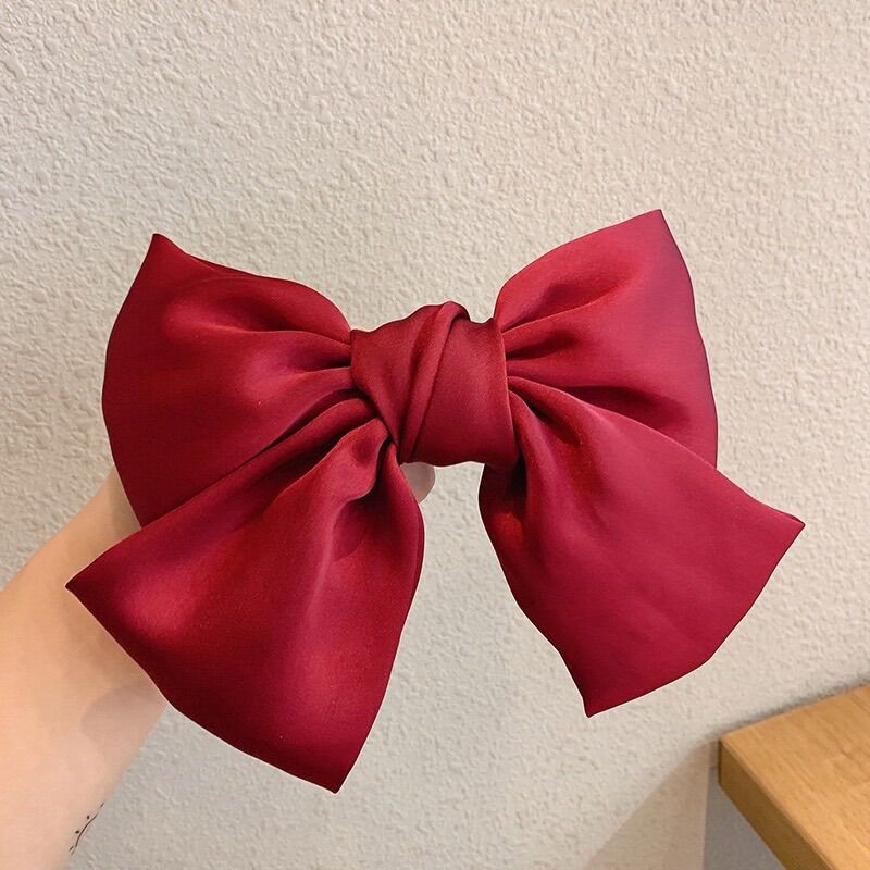 Kẹp tóc nơ đỏ