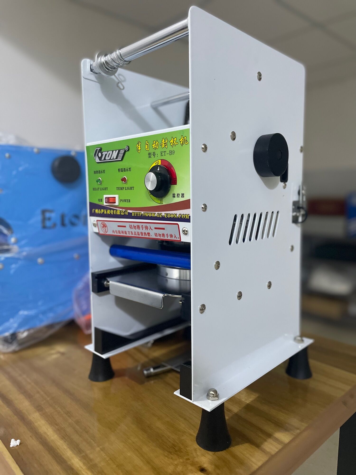 Máy ép miệng ly tự động cuốn màng Eton B9