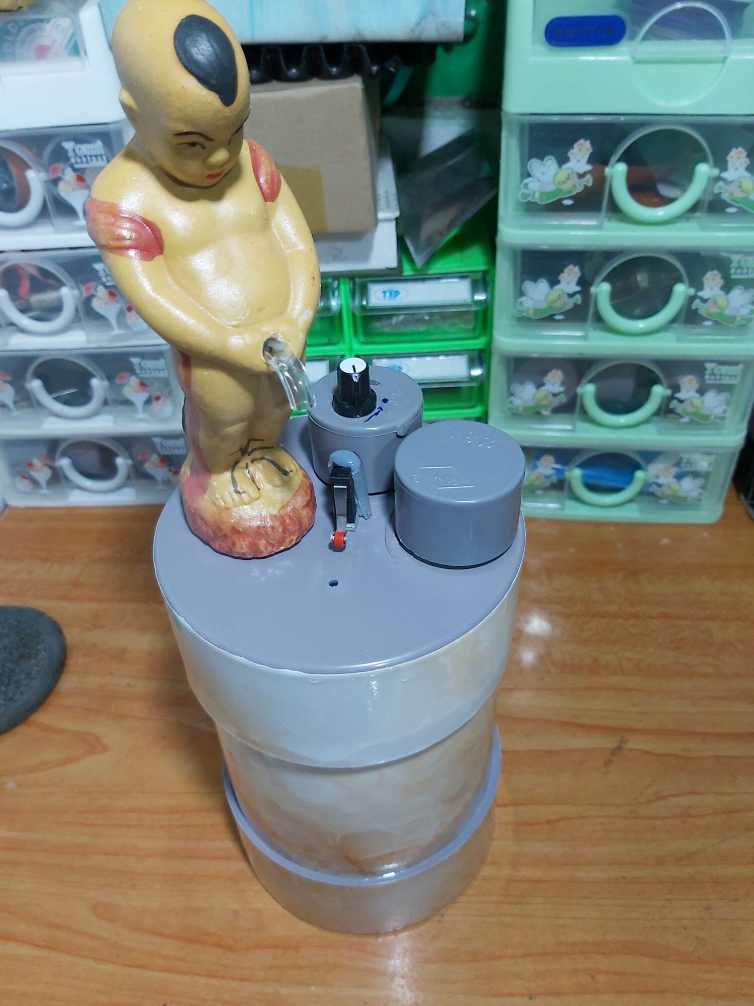 Bình đựng rót rượuu tự động chú tiểu