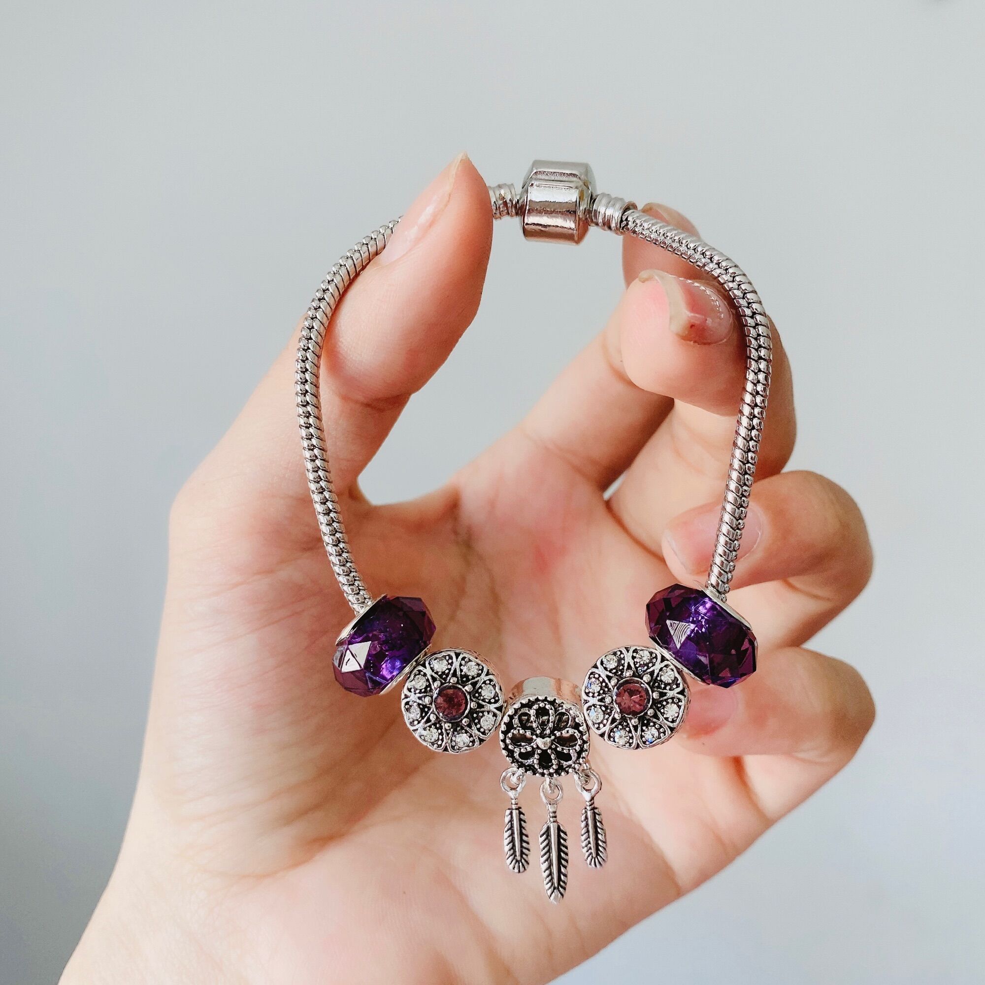 Vòng charm tím dream catcher mộng mơ