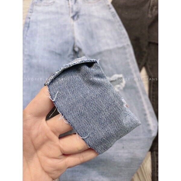 Quần jeans ôm co giãn rách bên đùi
