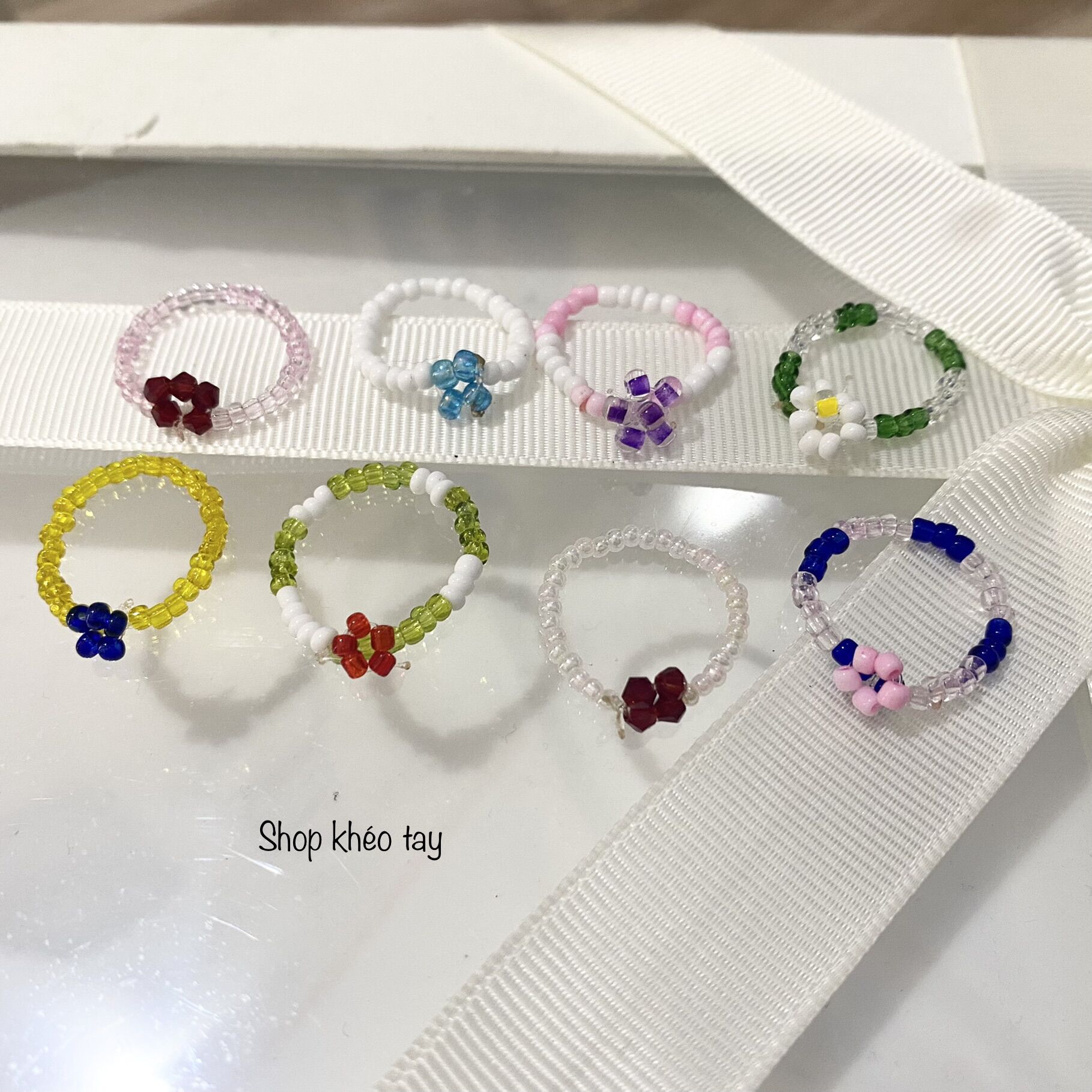 Nhẫn hạt cườm đính hoa siêu yêu