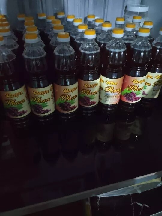 1 Lit Rựu Nho ( Nước Nho Lên Men) Nguyên Chất Nhà Làm