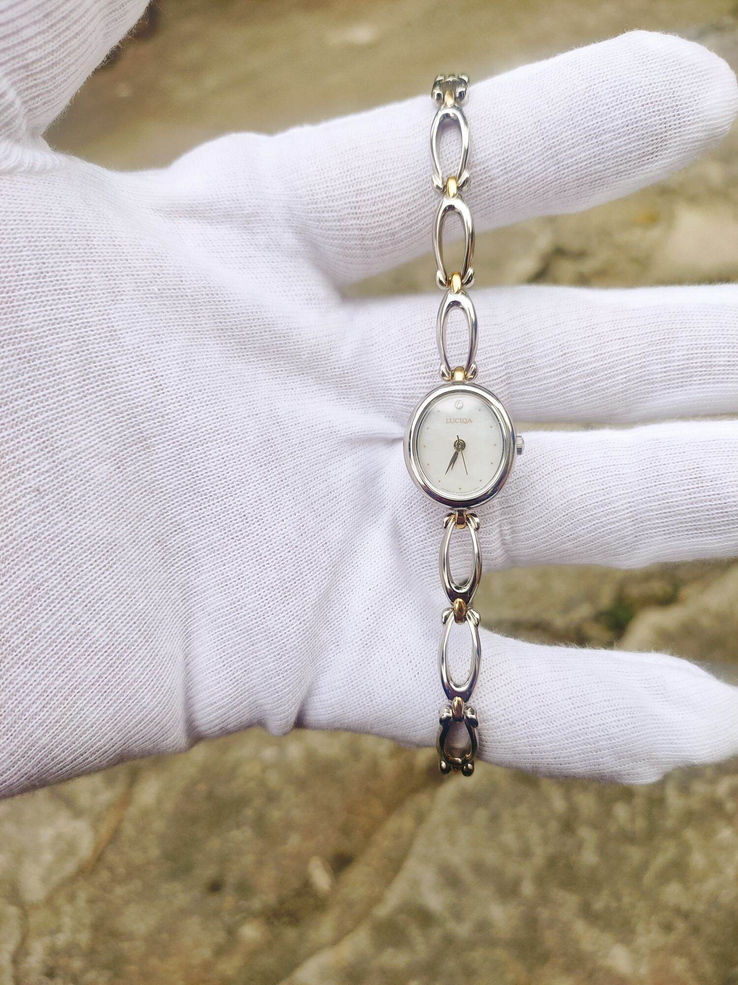Đồng hồ nữ Orient , mặt bầu dục size 17mm, dây thép không rỉ zin theo máy