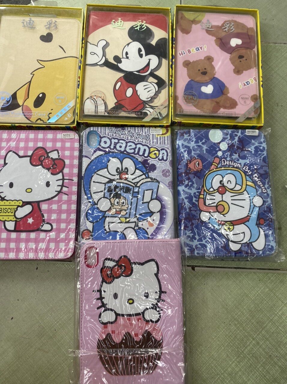 Bao da ipad mini6 ; mini5 ; mini 4 3 2 1 hình kitty và doẻmon