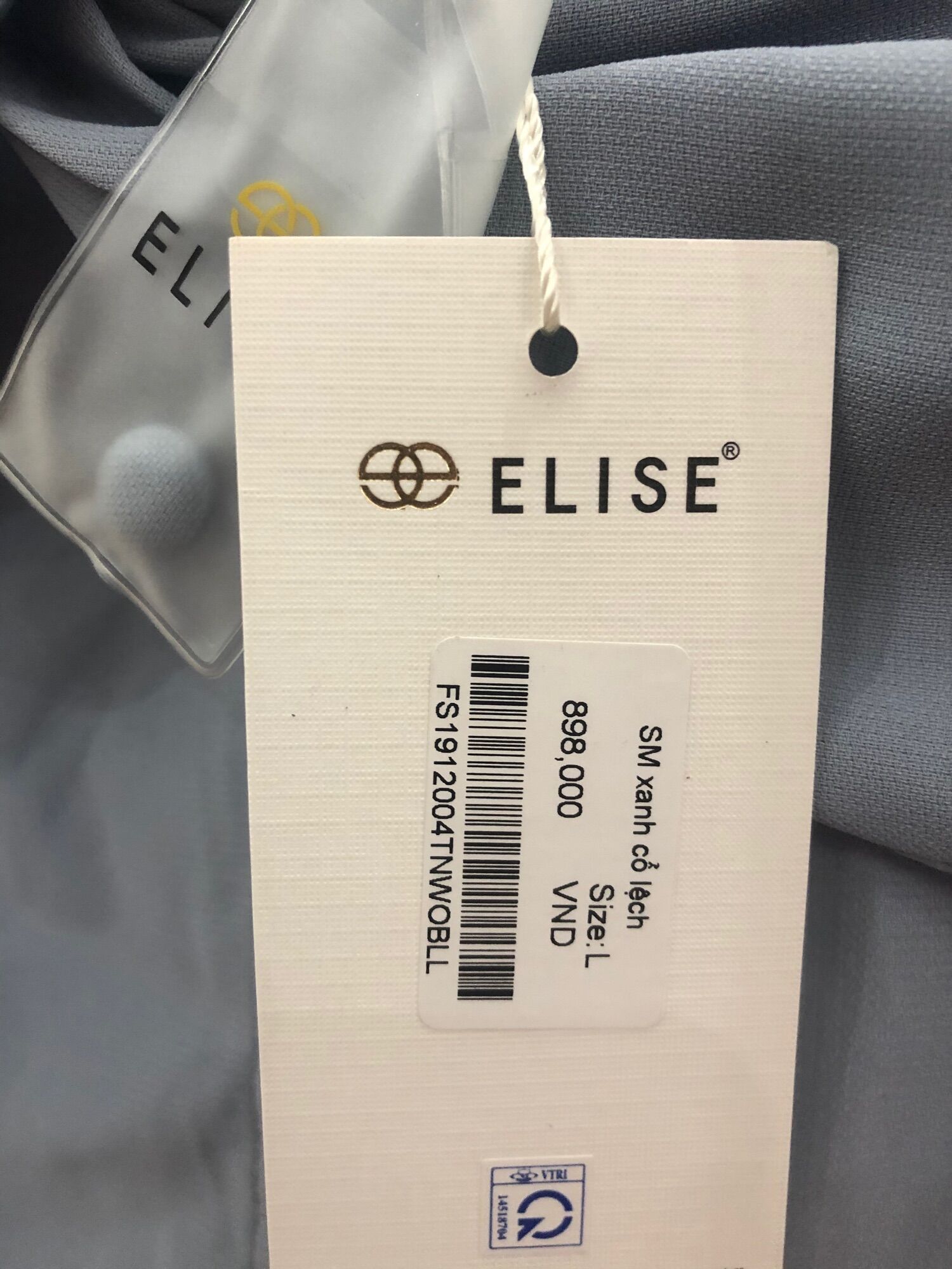 Elise Sơ mi xanh cổ lệch size L (form nhỏ = M) nguyên tag