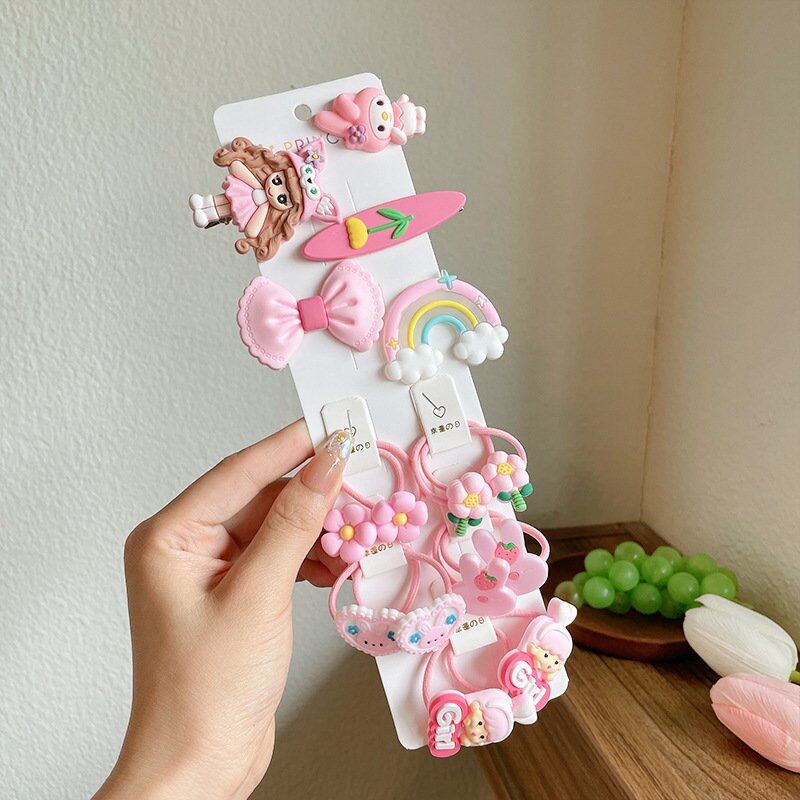Vỉ 15 buộc tóc kèm cột tóc cho bé