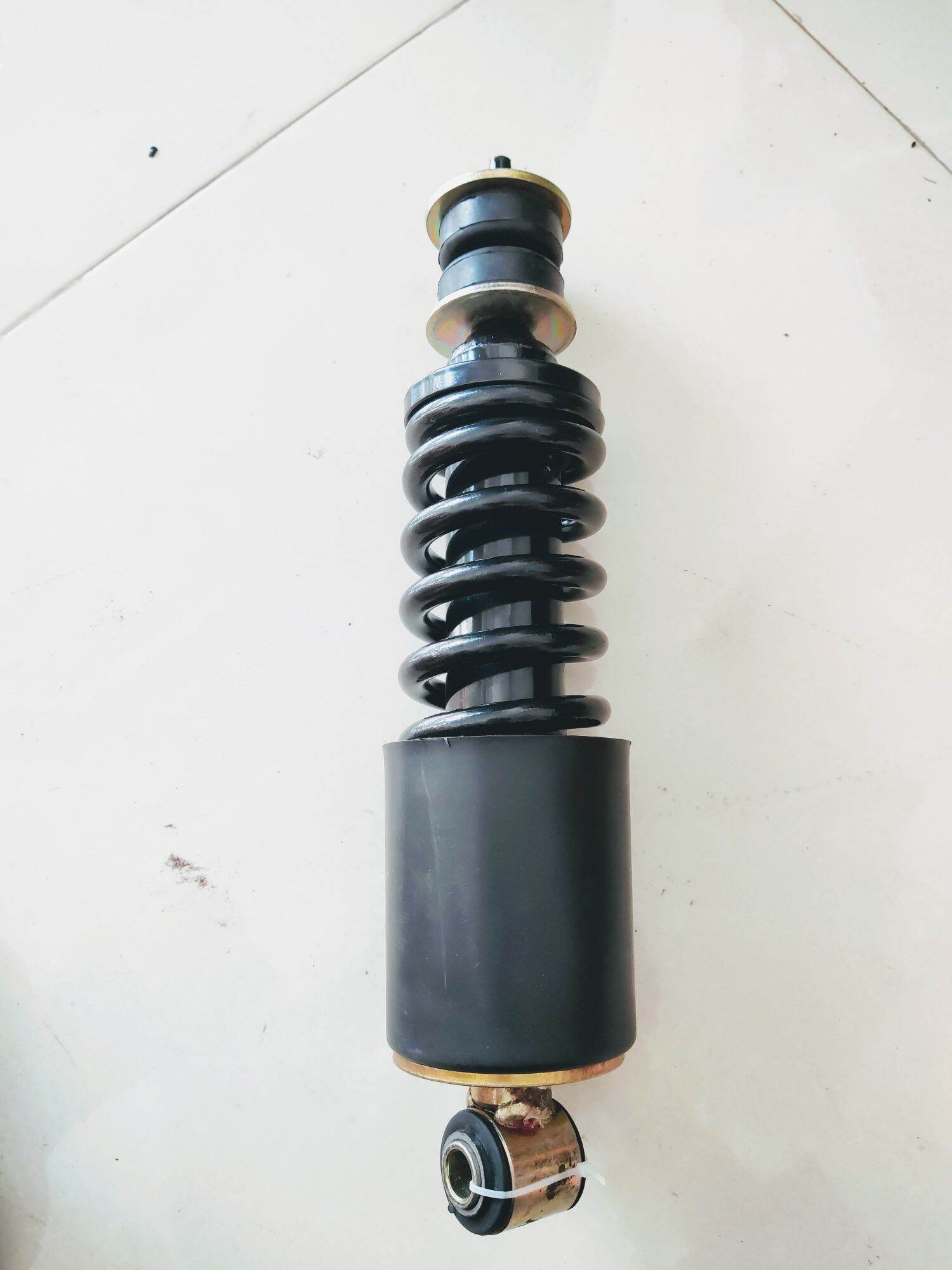 Giảm xóc lò xo trước Shacman