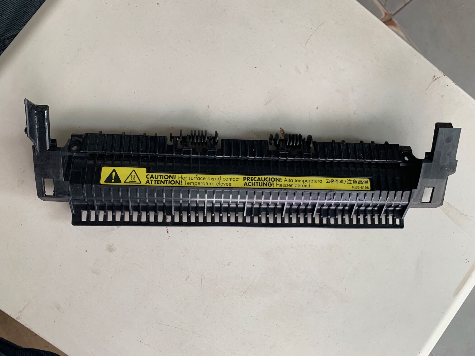 canon 2900 nắp nhựa bánh xe giấy ra trên sấy