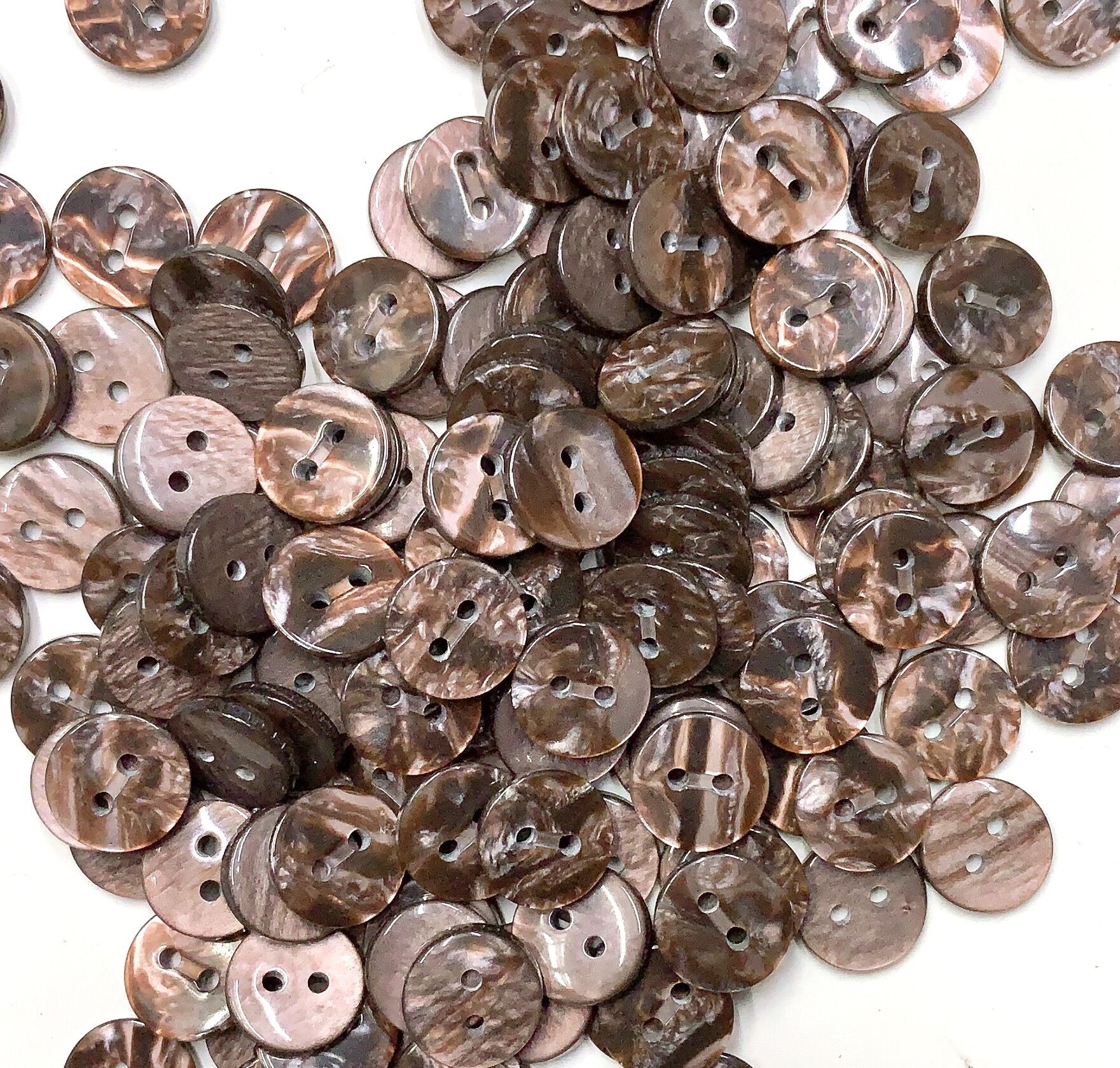 12 nút sơmi xà cừ 2 lỗ 13mm.