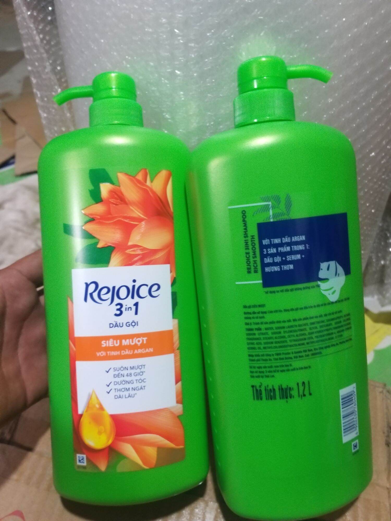 Dầu gội REJOICE 1,2L (1,35kg)  Siêu mềm mượt