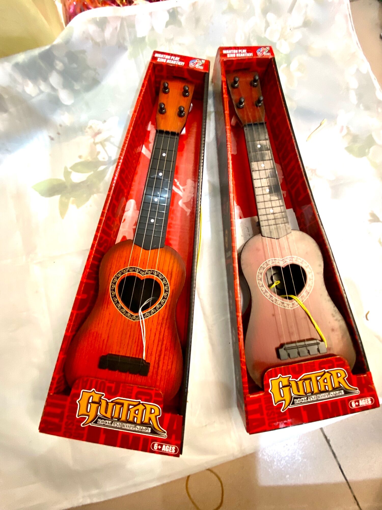 Đàn ghita nhựa giả gỗ