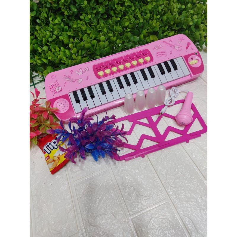 Đàn piano có micro có nhạc dành cho bé