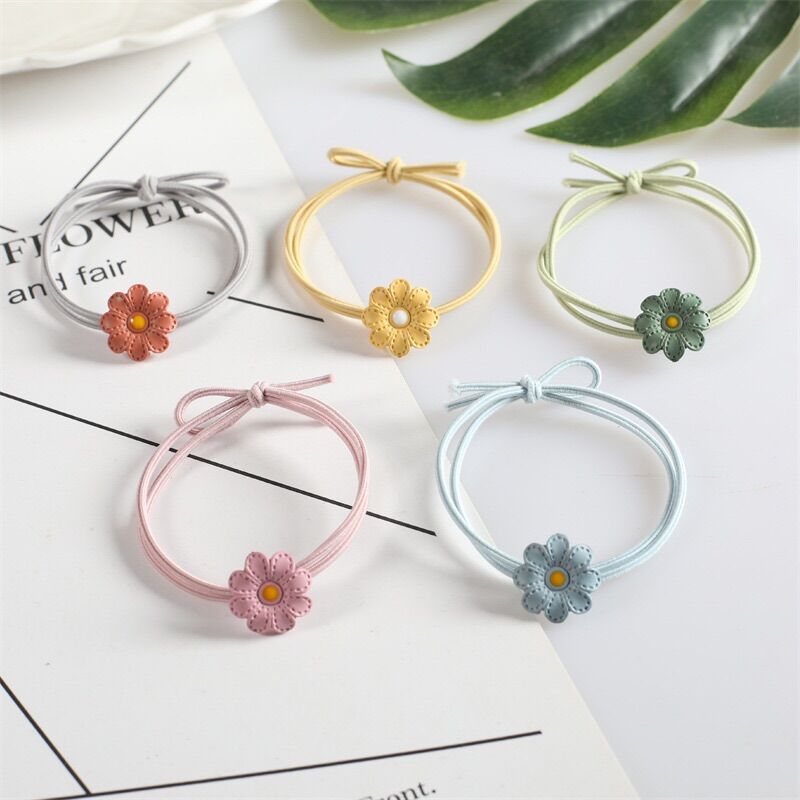 Set 100 dây buộc tóc hình bông hoa xinh xắn