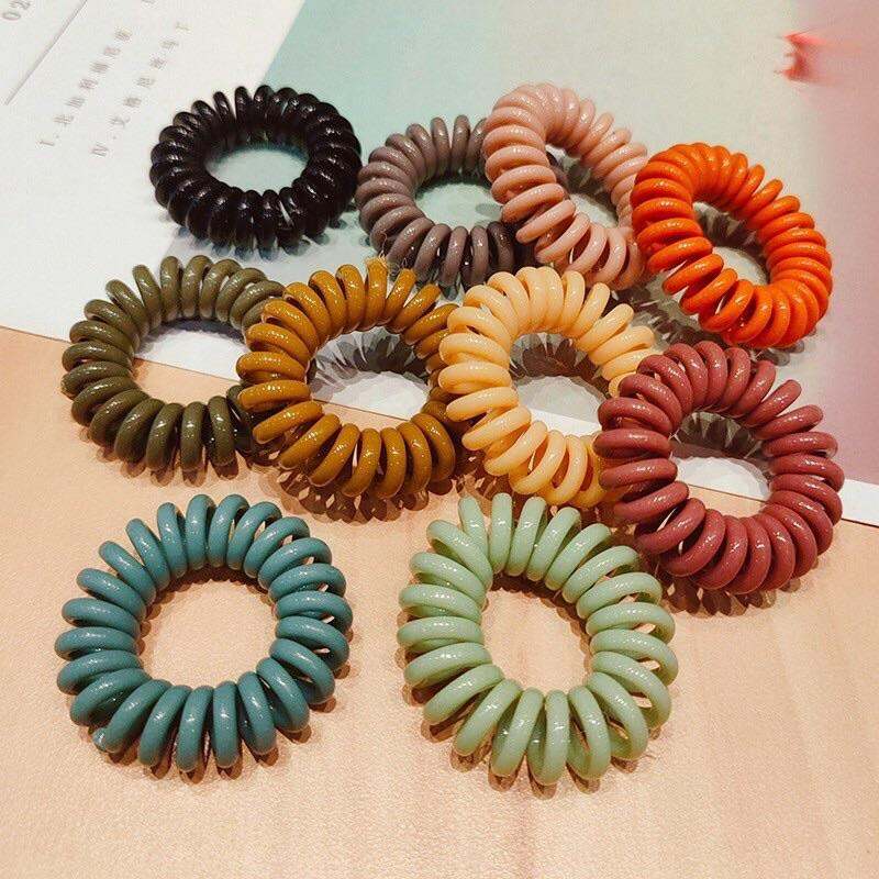 Dây buộc tóc lò dáng lò xo chất liệu nhựa nhiều màu dể thương cho nữ