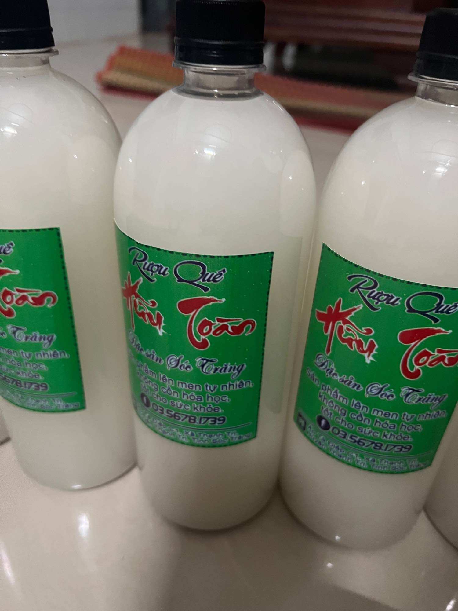 Rượu nếp sữa nhà làm, chai 1 lít 50k
