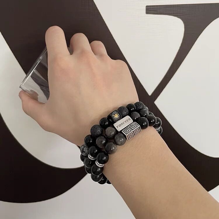 Vòng tay chuỗi hạt đen , lắc tay hạt đá nổ kèm biểu tượng