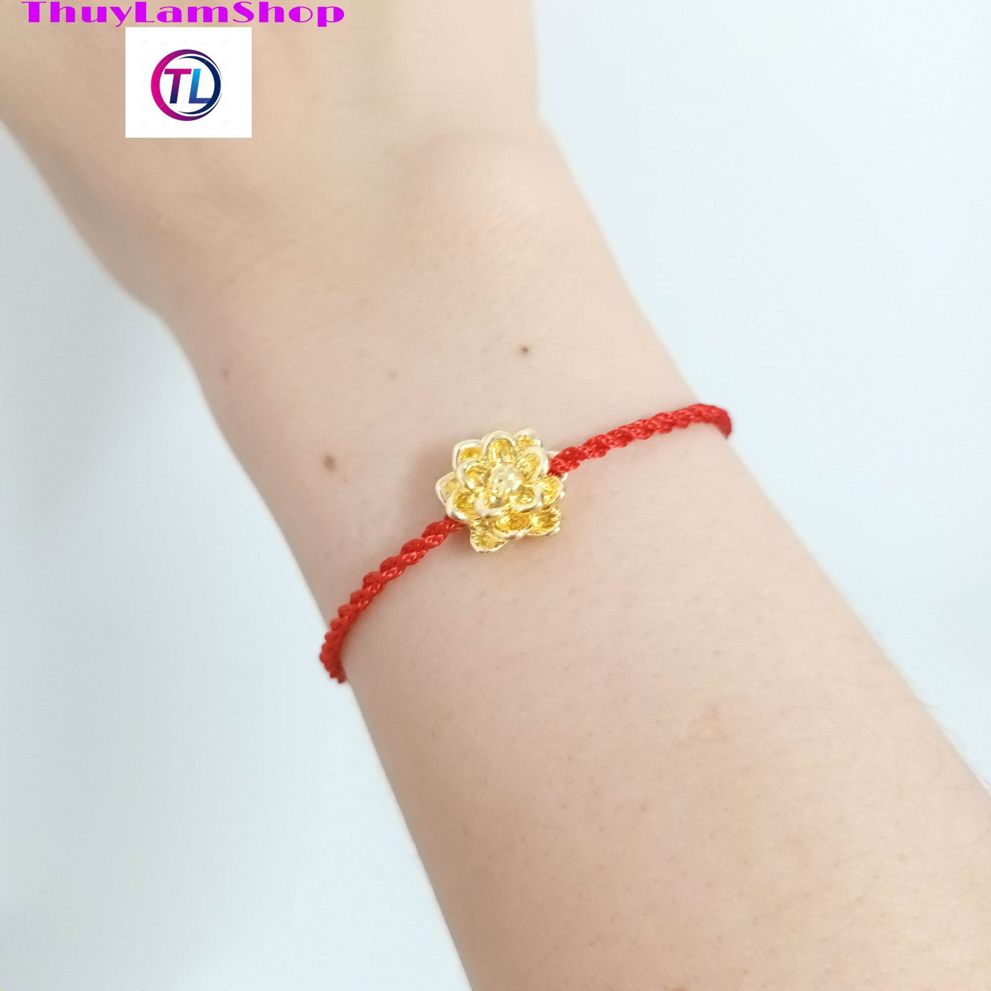 Vòng chỉ đỏ mix bông sen vàng nhà phật may mắn bìn an