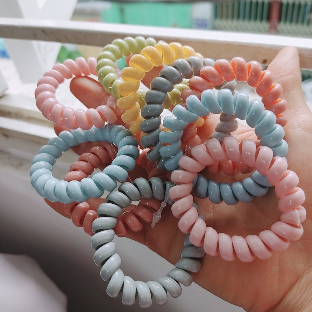 Cột tóc lò xo, cột tóc lò xo màu kẹo ngọt.
