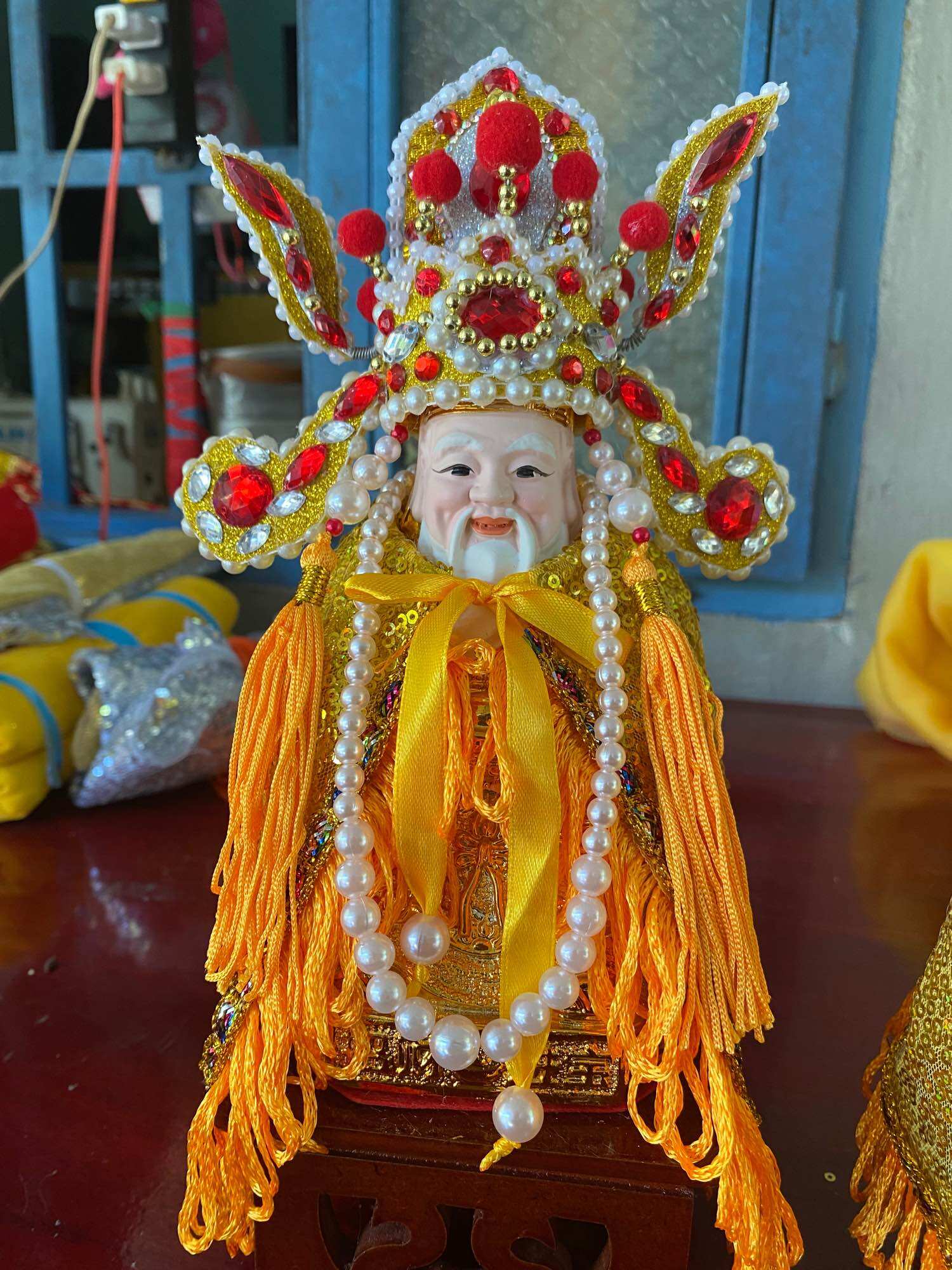 Áo mão ông thần tiền