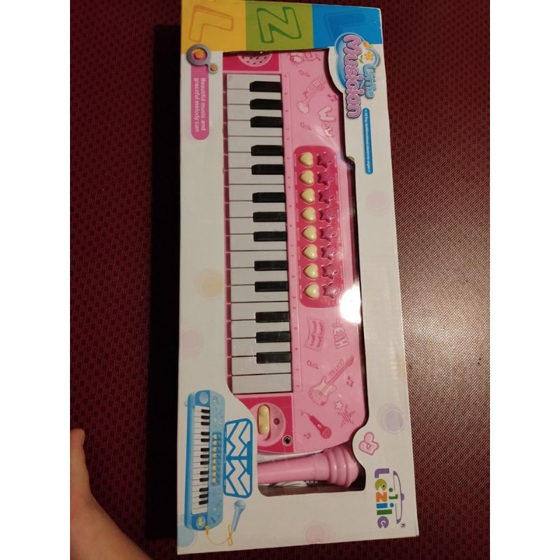 Đàn piano có micro có nhạc dành cho bé